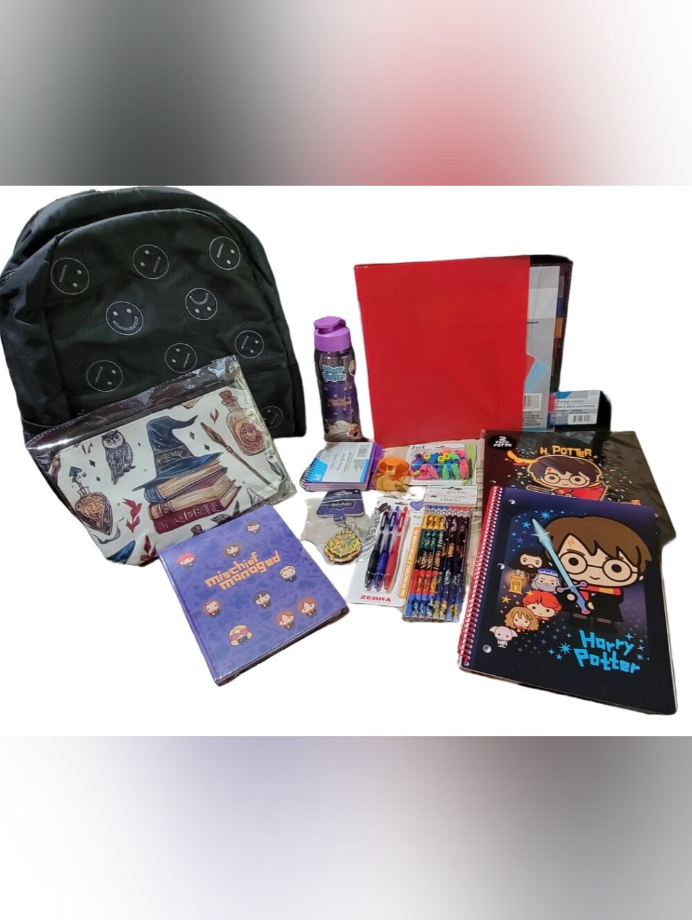Warner Bros. Black Smiley Backpack and Colorful Harry Potter Stationery Set